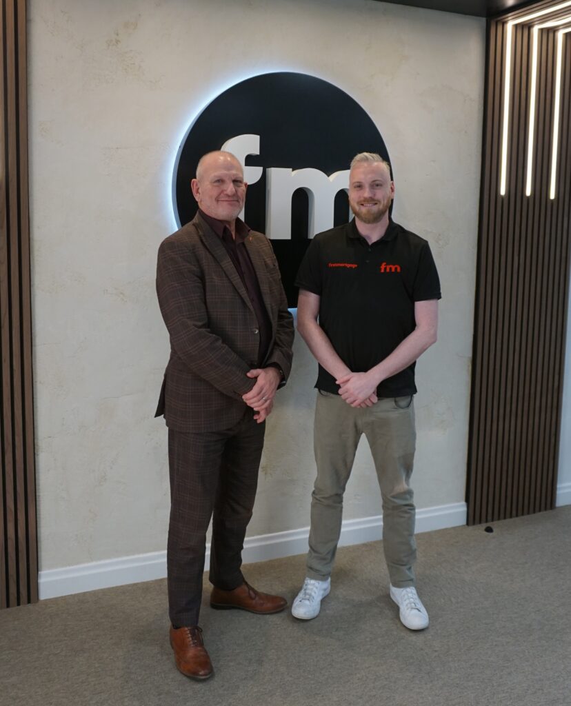 Staff from Smart IT and First Mortgage celebrate a successfull partnership