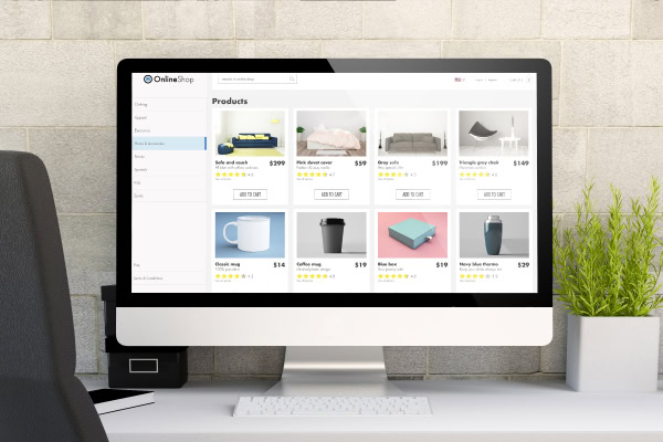 E-commerce website showcasing various products on a desktop monitor.